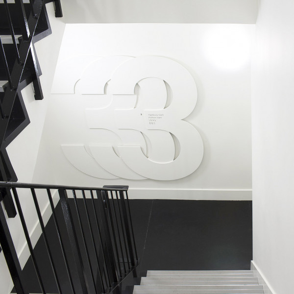 Endpoint's no.3 wayfinding design displayed on the wall