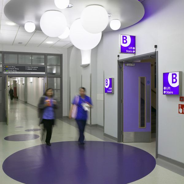 Hospital wayfinding strategy by endpoint - staff walking in the hospital