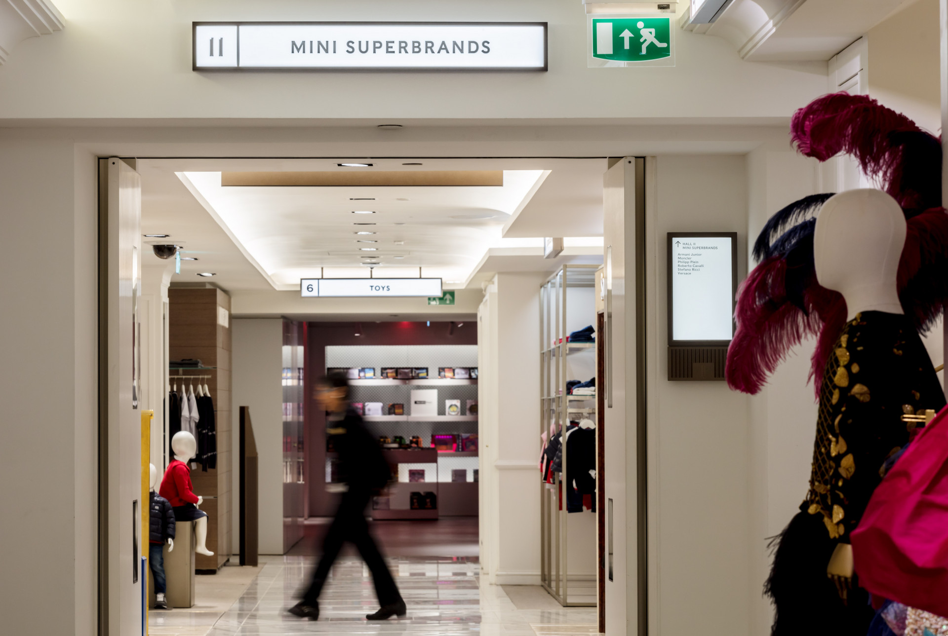 Customer shopping at Harrods - retail wayfinding