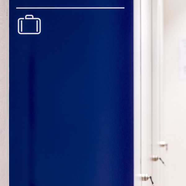 Corporate signage design - pictogram on lockers at Hikma's office